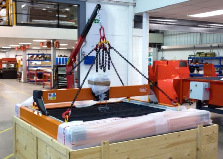 whatinbox Swift-Cut Swifty CNC plasma cutting table in a crate in a warehouse